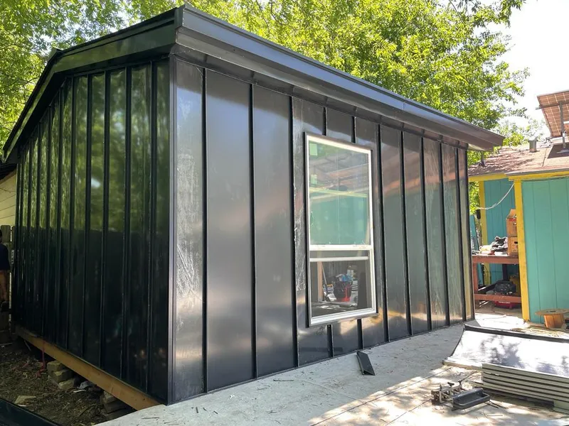 Black standing seam metal wall panels for Metal Roof Installation in Morrow