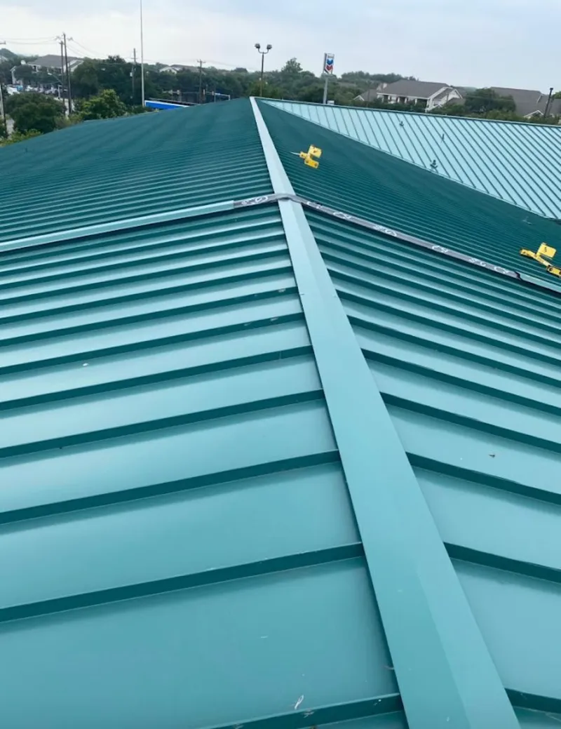 Green commercial metal roof ridge and valley for Metal Roof Repair in Morrow